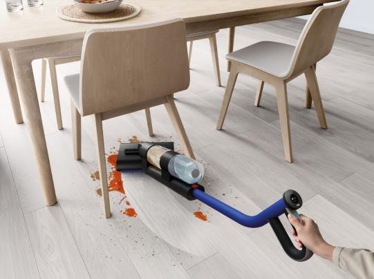 A vacuum cleaner on the floor

Description automatically generated